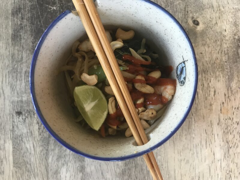 bowl of easy healthy pad thai with chicken and shrimp