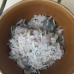 bowl of instant pot risotto in brown bowl