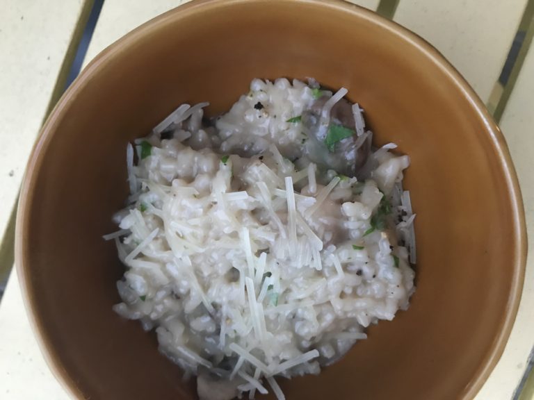 bowl of instant pot risotto in brown bowl