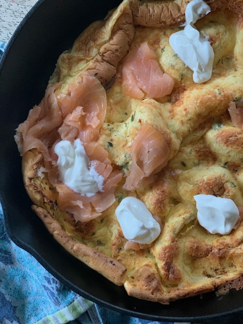 lemon thyme dutch baby with smoked salmon on table cloth